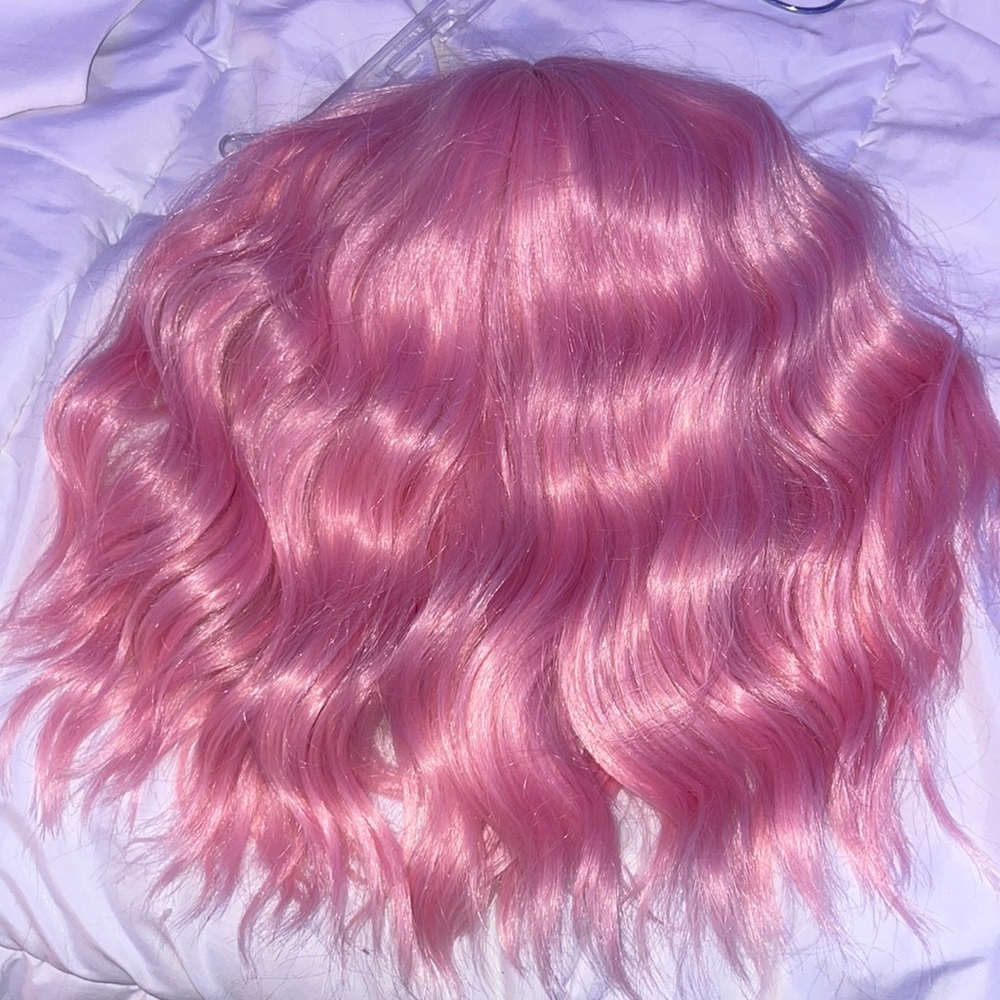 Pastel Pink Amazon Wig. Used once. Medium length wavy.